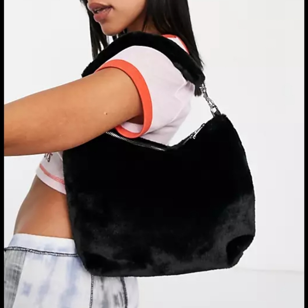 Black fuzzy ugg bag